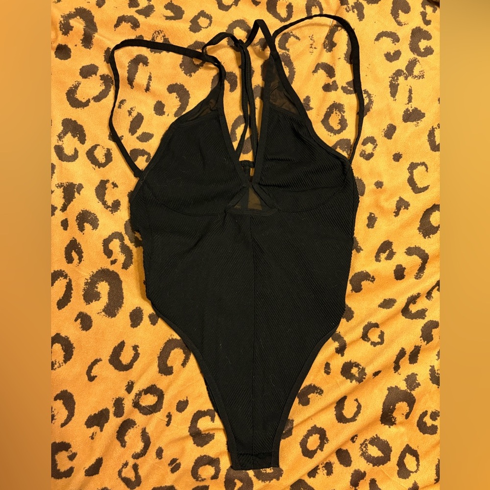 Black strappy Anthro bodysuit.